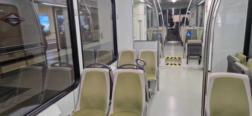 Interior of the Montserrat Rack Railway with seats and panoramic windows