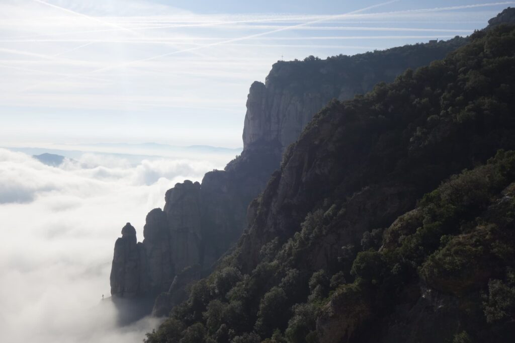 Sea of clouds surrounding the Montserrat mountain peaks in the morning
