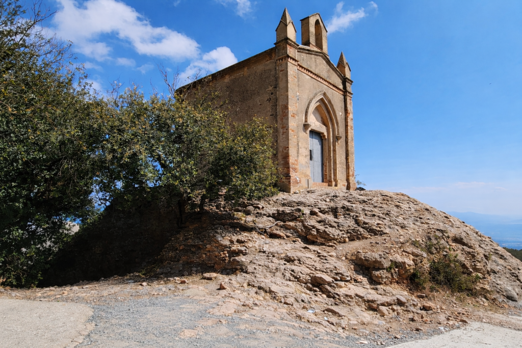 Sant Joan hermitage in Montserrat built into the rock with panoramic mountain views