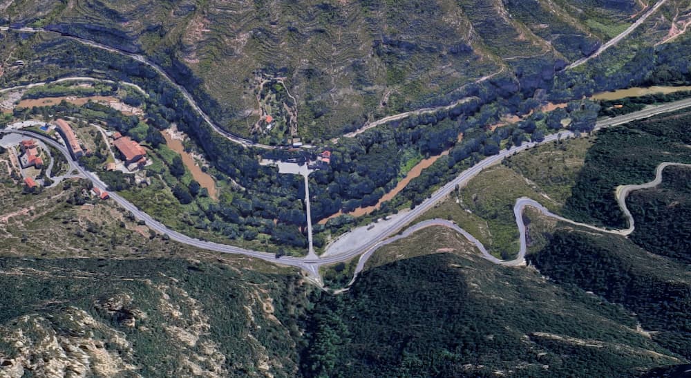 Aeri de Montserrat cable car station and parking area below Montserrat mountain