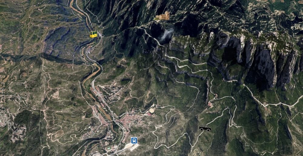 Mountain road access to Montserrat Monastery with winding roads and rocky cliffs