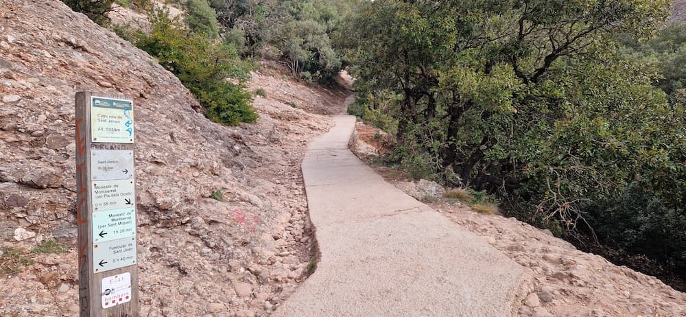 Sant Jeroni trail final section path sign Montserrat hiking route