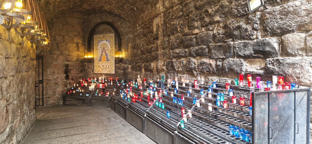 Camí de l’Ave Maria with candles at Montserrat Monastery