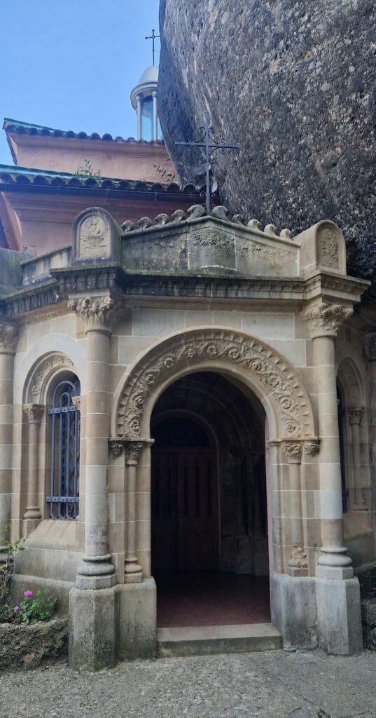Entrance to the Santa Cova de Montserrat chapel built into the rock face