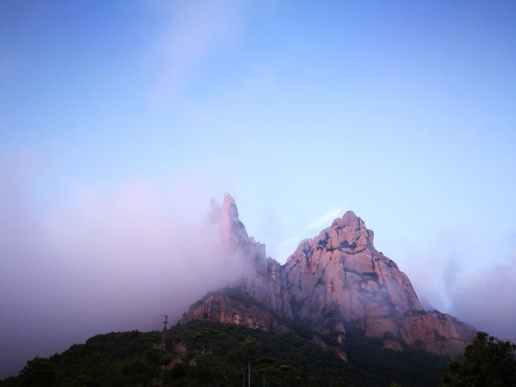Montserrat mountain peaks in autumn mist seen from Santa Cecília monastery