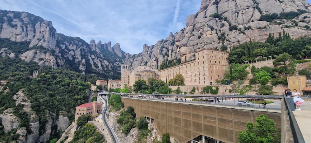 Panoramic view of Montserrat Monastery visited on tours from Barcelona