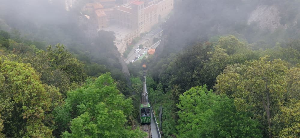 The Sant Joan funicular heading up to the Sant Joan upper station on a foggy day