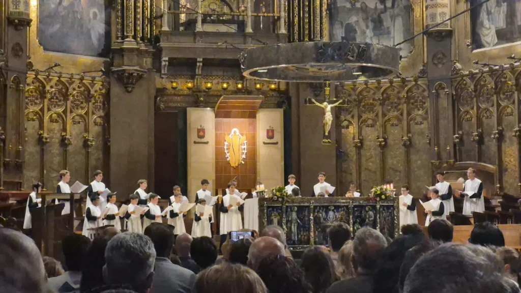 Montserrat boys choir singing in the basilica of montserrat.