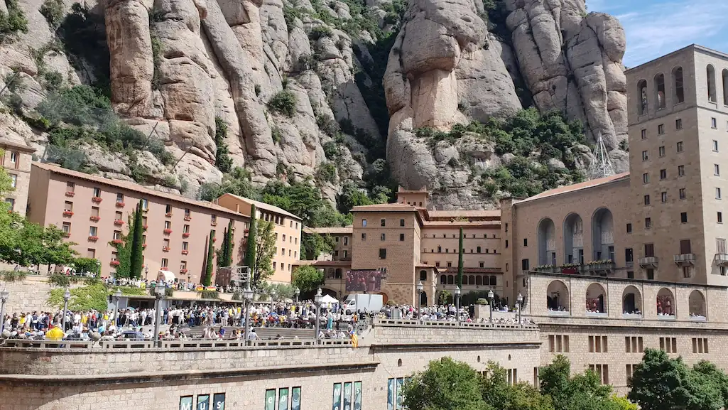 Pilgrims gathering below Montserrat Monastery on the morning of the Pope Leo XIV Montserrat visit