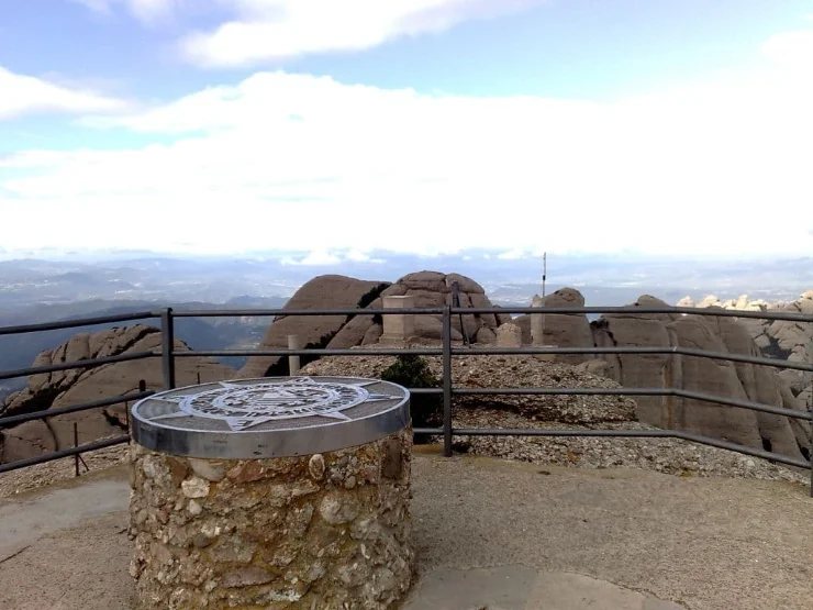 Old stone water basin on a Montserrat path