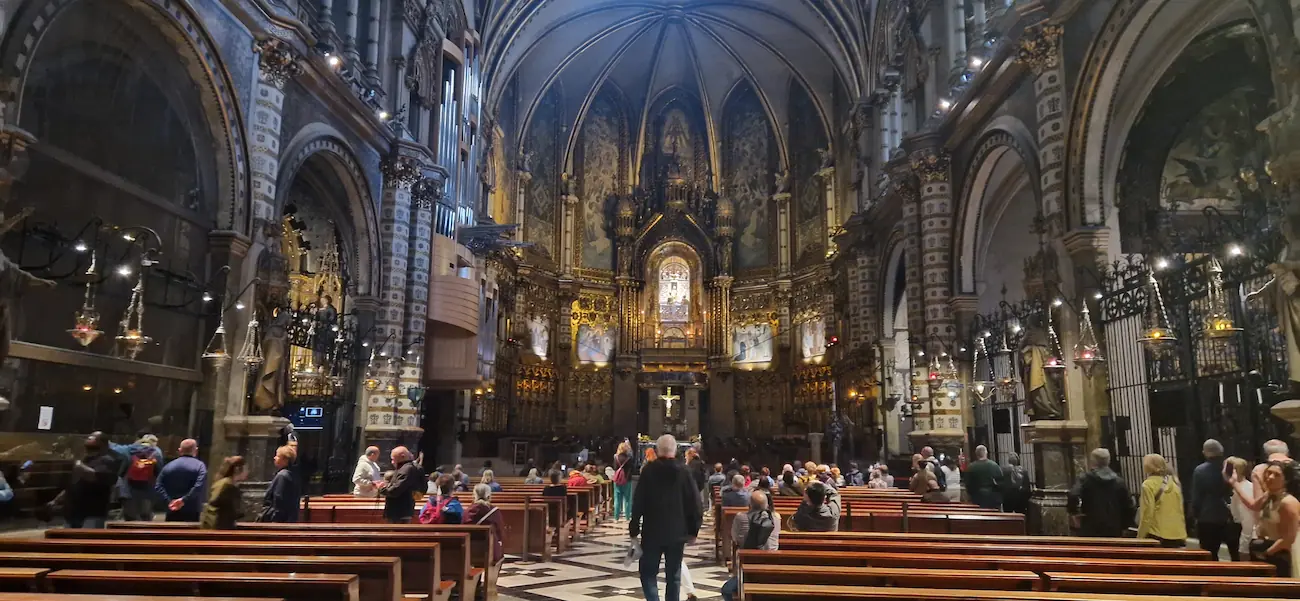 Masses at Montserrat: interior of the basilica, nave looking towards the gilded main altar